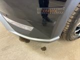 a sticker on the front of a car that says auto repair