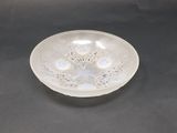 an image of a clear glass bowl on a black surface