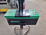 une image représentant une machine posée sur un socle