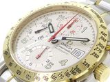 an image of a close up of a watch on a white surface