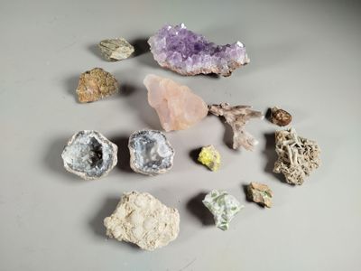 many different types of rocks and stones on the table