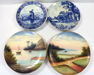 trois assiettes décoratives représentant un paysage et un bateau sur l'eau