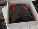 a box with a bag inside of it on a table