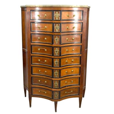 an image of a wooden chest of drawers with a marble top