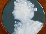 a picture of a woman with a flower in her hair