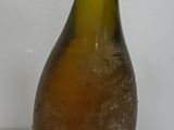 a bottle of wine that is sitting on a table