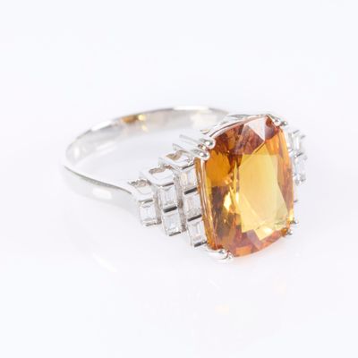 an image of a ring with a large citrine stone
