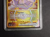 a pokemon card in a plastic container on a table