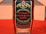 a bottle of whiskey that is sitting on a table