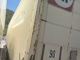 a truck that is parked on the side of the road