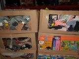 two cardboard boxes that have various items in them