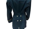 an image of a blue military jacket on a mannequin stand