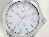an image of a close up of a watch on a white surface