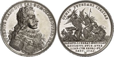 a close up of a coin with an image of a man on a horse