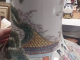 a vase that is sitting on a table in a room