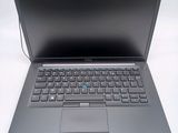 a laptop computer with a keyboard on the top of it