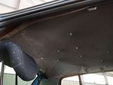a close up of a car ' s hood with a bike attached to it