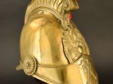 helmet of a roman soldier with a red mohawk on a black background