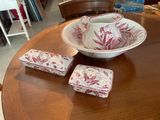 a bowl and napkins sitting on a table in a room