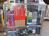 a large metal cart with many different items in it