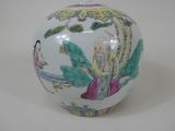 a white vase with a picture of a woman and a bird on it