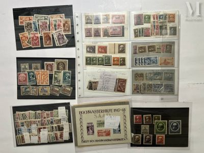 many different types of stamps on display in a display case