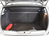 a trunk of a car with luggage in it