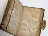 an open book that is sitting on a table