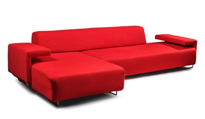 red couch with chaise lounger and ottoman on a white background