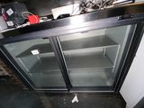 an image of a refrigerator with glass doors in a kitchen