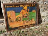 a sign on the side of a stone wall that says amontisseer houdaille