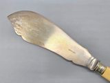 a knife that is sitting on a table