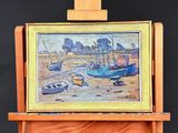 a picture of a painting on a easel on a black background