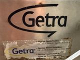 a sign that says getra on the side of a machine