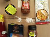 a table with a variety of condiments and condiments on it