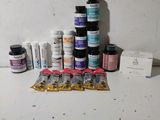 many different types of paint on the table