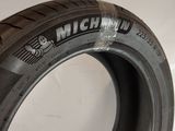 a close up of a tire on a white surface