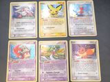 the pokemon cards are sitting on the table ready to be played