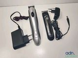 an image of a hair clipper and a charger on a table