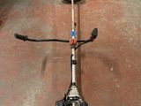 a close up of a string trimmer on the floor