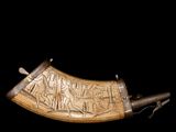 a close up of a very old looking object on a black background
