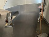 a machine that is sitting inside of a building