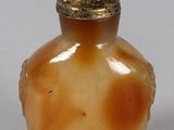 an image of a vase with a lid on a table