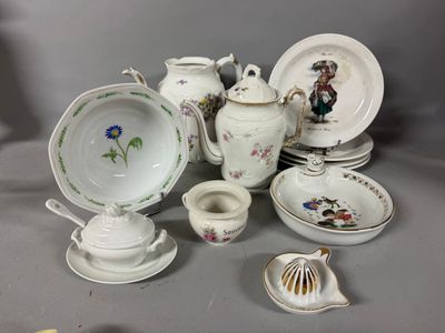 many different pieces of china on the table