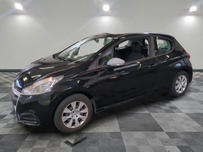 a picture of a black car parked in a garage