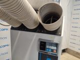 an image of a machine that has a hose on top of it
