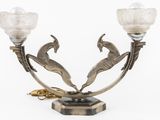 pair of art nouveau style candlesticks with two birds on them