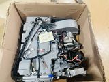 a box with a bunch of electronic parts in it