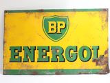 yellow and green sign with the word p p energot on it