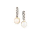 a pair of pearl and diamond earrings